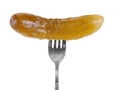 Marinated cornichon on the fork