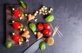 Marinated fillet with tomato and sausage heart shaped.