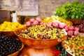 Marinated garlic and olives on provencal street market in Proven Royalty Free Stock Photo