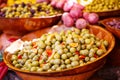 Marinated garlic and olives on provencal street market in Proven Royalty Free Stock Photo