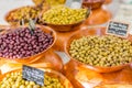 Marinated garlic and olives on provencal street market in Provence, France. Selling and buying. Royalty Free Stock Photo