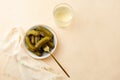 Marinated gherkins in a bowl and pickled juice or cucumber pickle Royalty Free Stock Photo