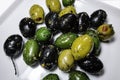 Marinated green and black olives