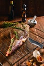 Marinated lamb leg with spice and herbs, olive oil and garlic Royalty Free Stock Photo