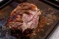 Marinated lamb meat cooked in the oven, seasoned with spices. Homemade cooking