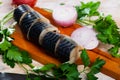 Marinated mackerel with sliced onion and parsley