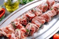 Marinated meat for barbecue. Meat skewered and ready to grill Royalty Free Stock Photo