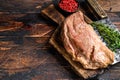 Marinated in mustard Marinate beef tri tip steak for bbq. Black background. Top view. Copy space Royalty Free Stock Photo