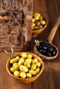 Marinated Olives in bowls with moroccan ornament on wood Royalty Free Stock Photo