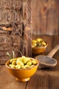 Marinated Olives in bowls with moroccan ornament on wood Royalty Free Stock Photo