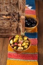 Marinated Olives in bowls with moroccan ornament on wood Royalty Free Stock Photo