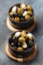 Marinated olives with herbs and garlic in bowl Royalty Free Stock Photo