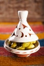 Marinated Olives in tajine bowls with moroccan ornament on wood Royalty Free Stock Photo