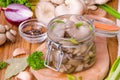Marinated Oyster Mushrooms with spices in a glass jar
