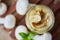 Marinated pickled champignon mushrooms