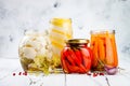 Marinated pickles variety preserving jars. Homemade cauliflower, squash, carrots, red chili peppers pickles. Fermented food Royalty Free Stock Photo