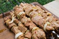 Marinated raw pork skewers with onion rings on skewers. Barbecue With Delicious Grilled Meat Royalty Free Stock Photo