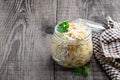 Marinated sprouted mung beans in glass jar on wooden table Royalty Free Stock Photo