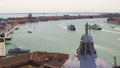 Marine cityscape picturing channel with historical buildings on banks, Venice