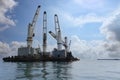 Marine cranes are used for loading and unloading cargo onto ships Royalty Free Stock Photo