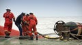 Marine crew doing hose connection operation