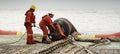 Marine crew doing hose connection operation