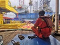 Marine crew get ready to work near jack up rig