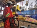 Marine crew get ready to work near jack up rig