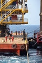 Marine crews work on mooring ropes