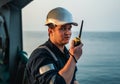 Marine Deck Officer or Chief mate on deck of offshore vessel or ship , wearing PPE personal protective equipment Royalty Free Stock Photo