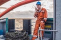 Marine Deck Officer or Chief mate on deck of ship with VHF radio Royalty Free Stock Photo