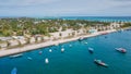 Marine dock with boats and ships in the lagoon at the tropical island at the indian ocean Royalty Free Stock Photo