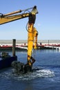 Marine dredging digging sea bottom black mud