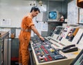 Marine engineer officer starts or stops main engine of ship