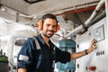 Marine engineer officer working in engine room