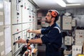 Marine engineer officer working in engine room Royalty Free Stock Photo