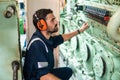 Marine engineer officer working in engine room