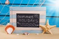 Marine frame with text written on blackboard Royalty Free Stock Photo