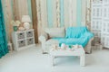 Marine Interior. White sofa and table, seashells, turquoise decor