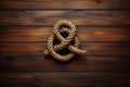 Marine knot rope on wooden background. Generate AI