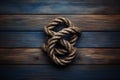 Marine knot on wooden background. Generate AI
