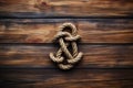 Marine knot on wooden ship background. Generate AI