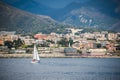 Marine landscape of Genova and a sail boat