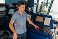 Marine navigational officer during navigational watch on Bridge Royalty Free Stock Photo