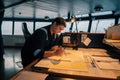 Marine navigational officer during navigational watch on Bridge Royalty Free Stock Photo