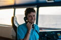 Marine navigational officer is reporting by VHF radio Royalty Free Stock Photo