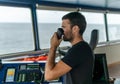 Marine navigational officer is reporting by VHF radio Royalty Free Stock Photo