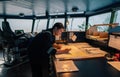 Marine navigational officer during navigational watch on Bridge Royalty Free Stock Photo