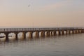 Marine pier for boats and yachts against the backdrop of the sunset. The Gulf of Finland. Royalty Free Stock Photo