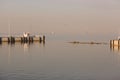 Marine pier for boats and yachts against the backdrop of the sunset. The Gulf of Finland. Royalty Free Stock Photo